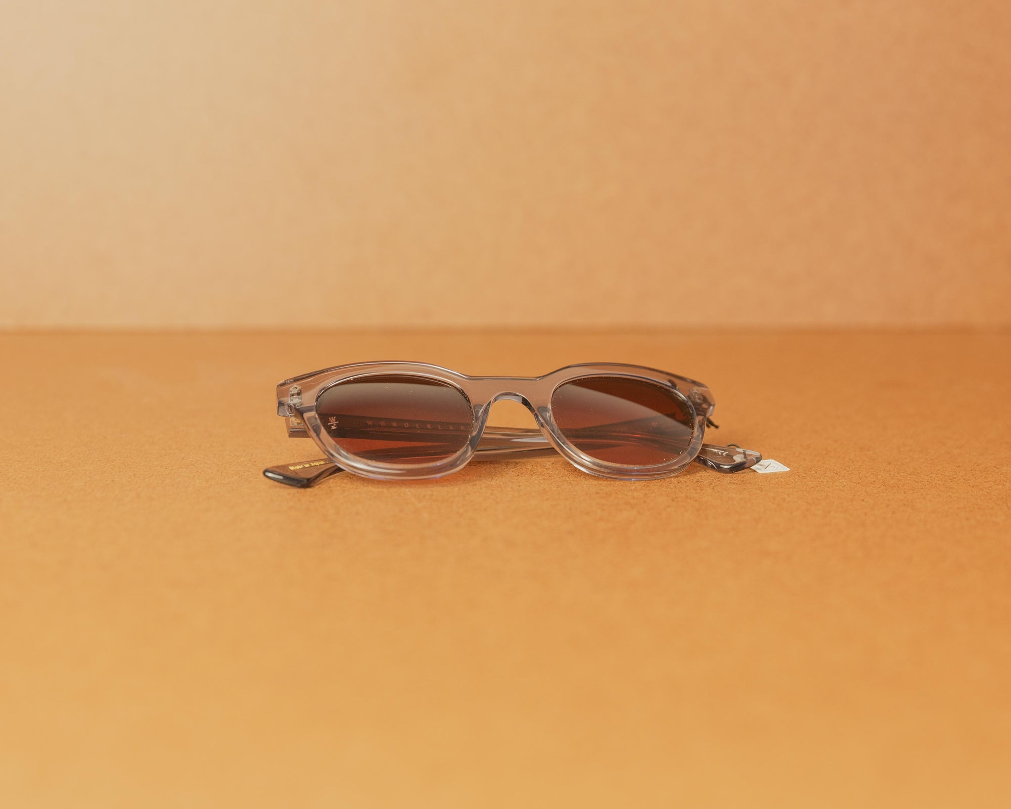 Wonderland Perris Sunglasses in Clear Gray/Red