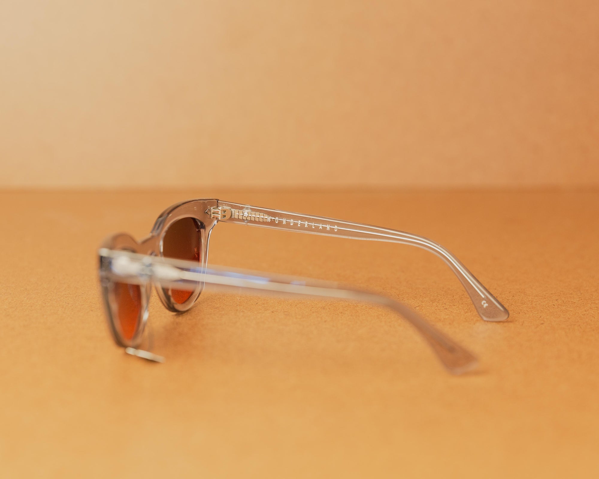Wonderland Perris Sunglasses in Clear Gray/Red