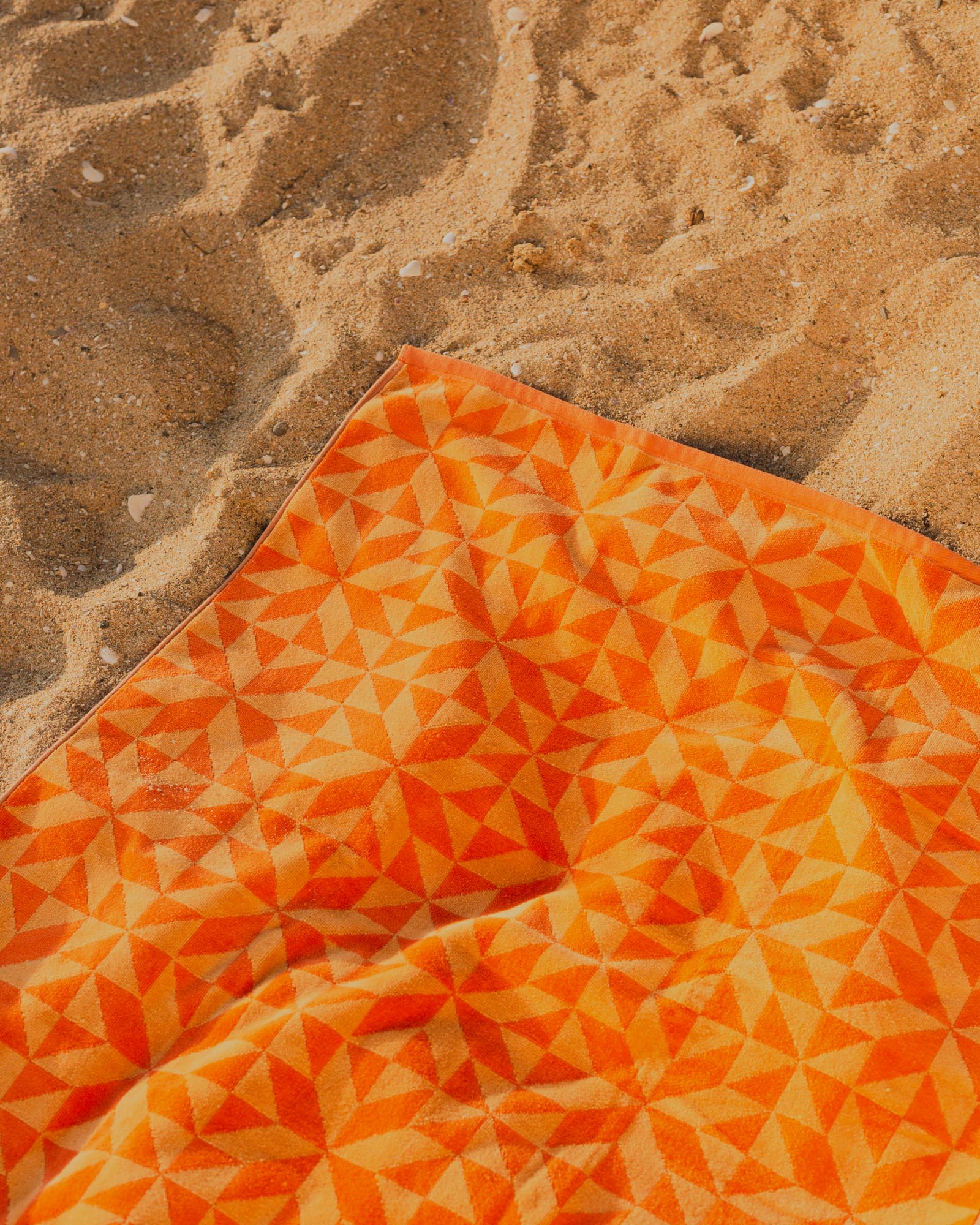 Daydream Quilt Print Beach Towel in Orange, Close-up