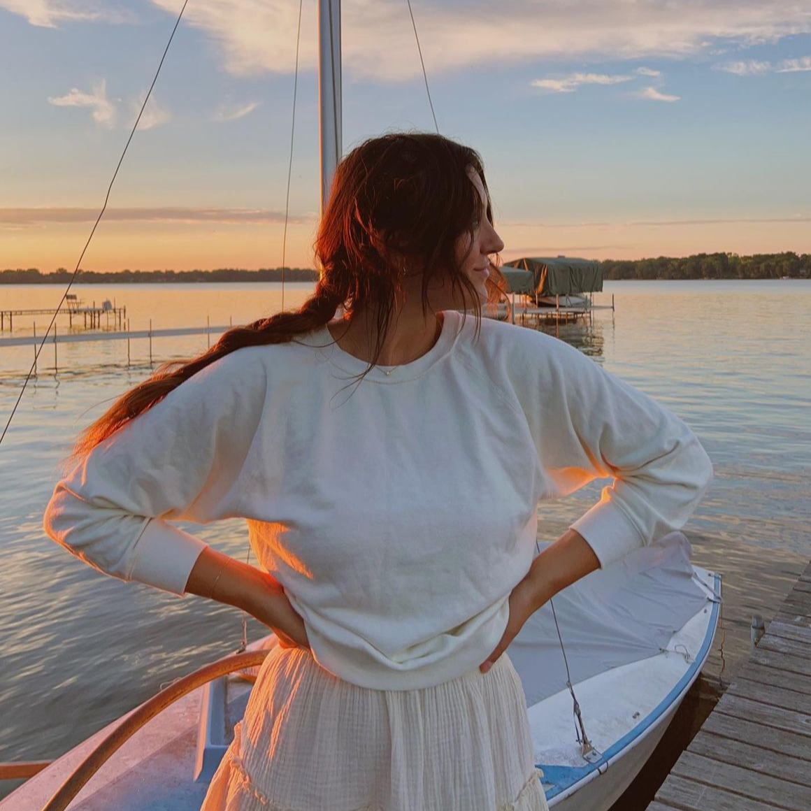 Model wearing Womens Raglan Crewneck in White