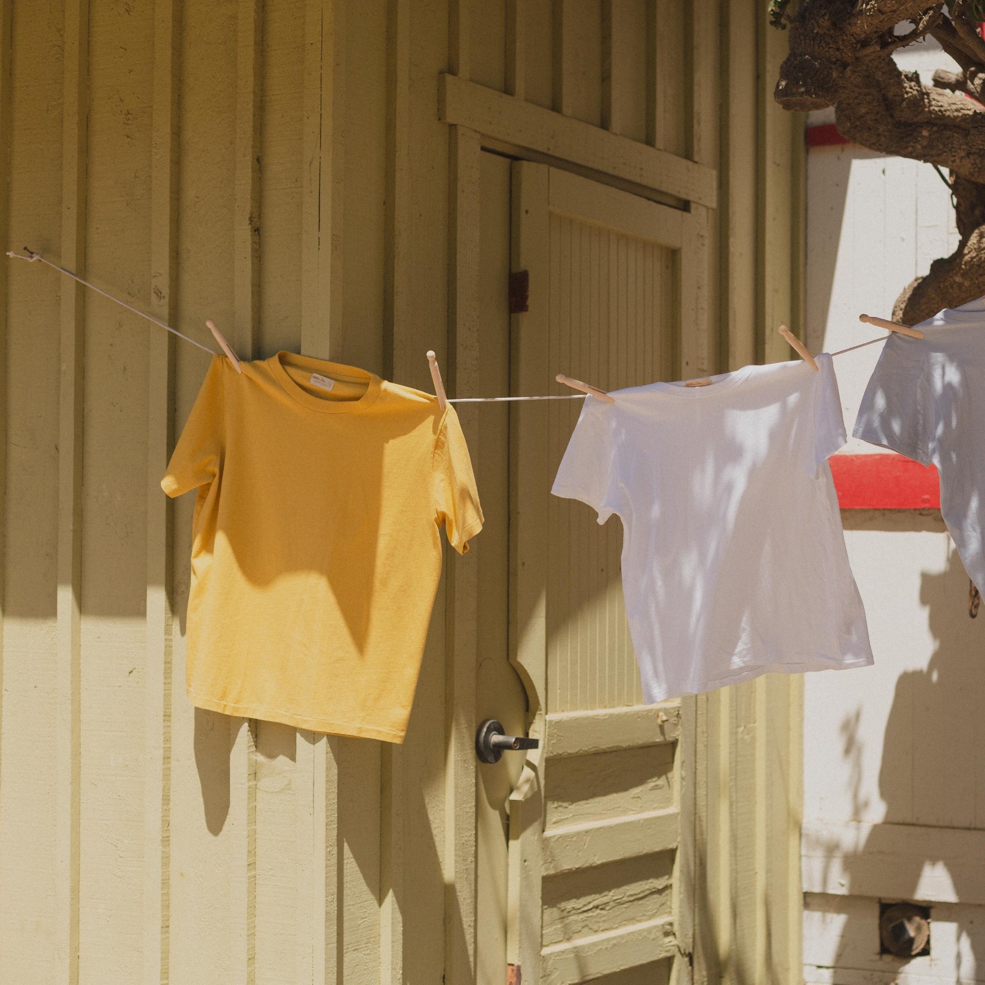 Mens Vintage Boxy Cotton Tee in Yellow on Clothing Line