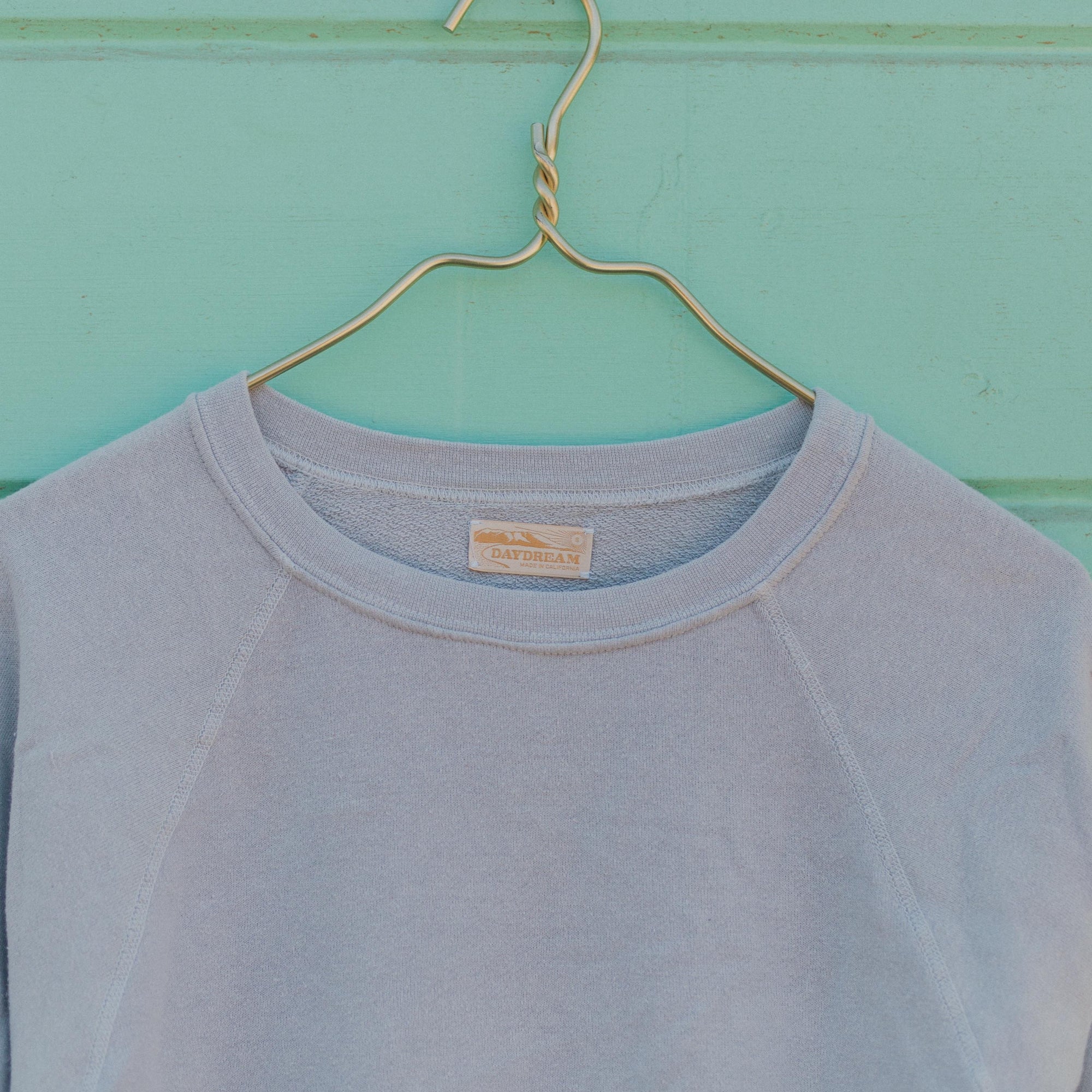 Collar of Womens Raglan Crewneck in Blue