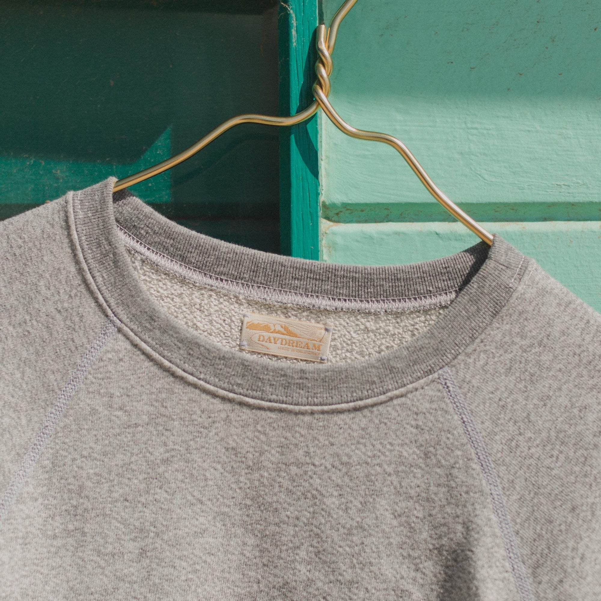 Collar of Womens Raglan Crewneck in Gray