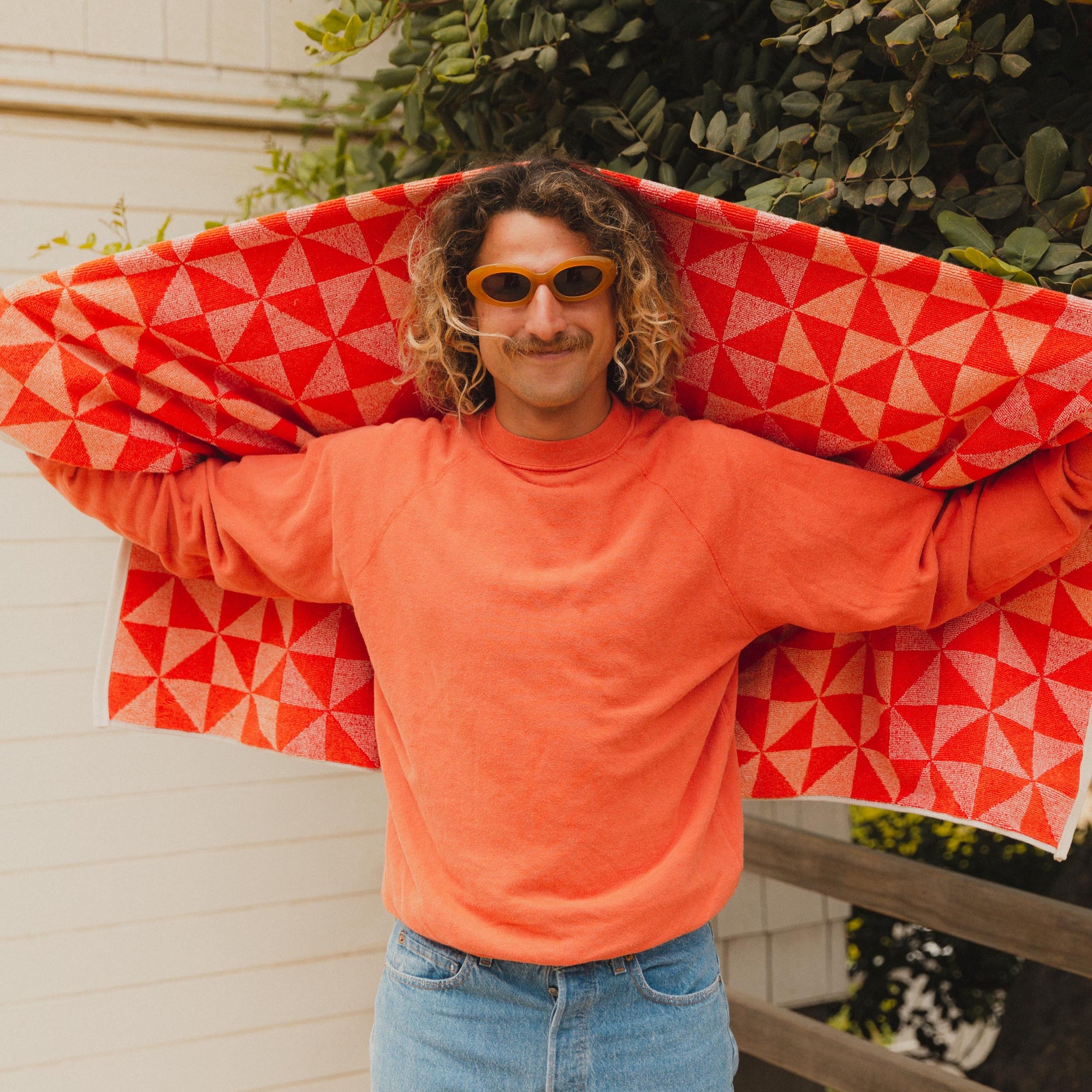 Mens Raglan Crewneck in Red and Quilt Towel, Model wearing Crap Eyewear Sunglasses