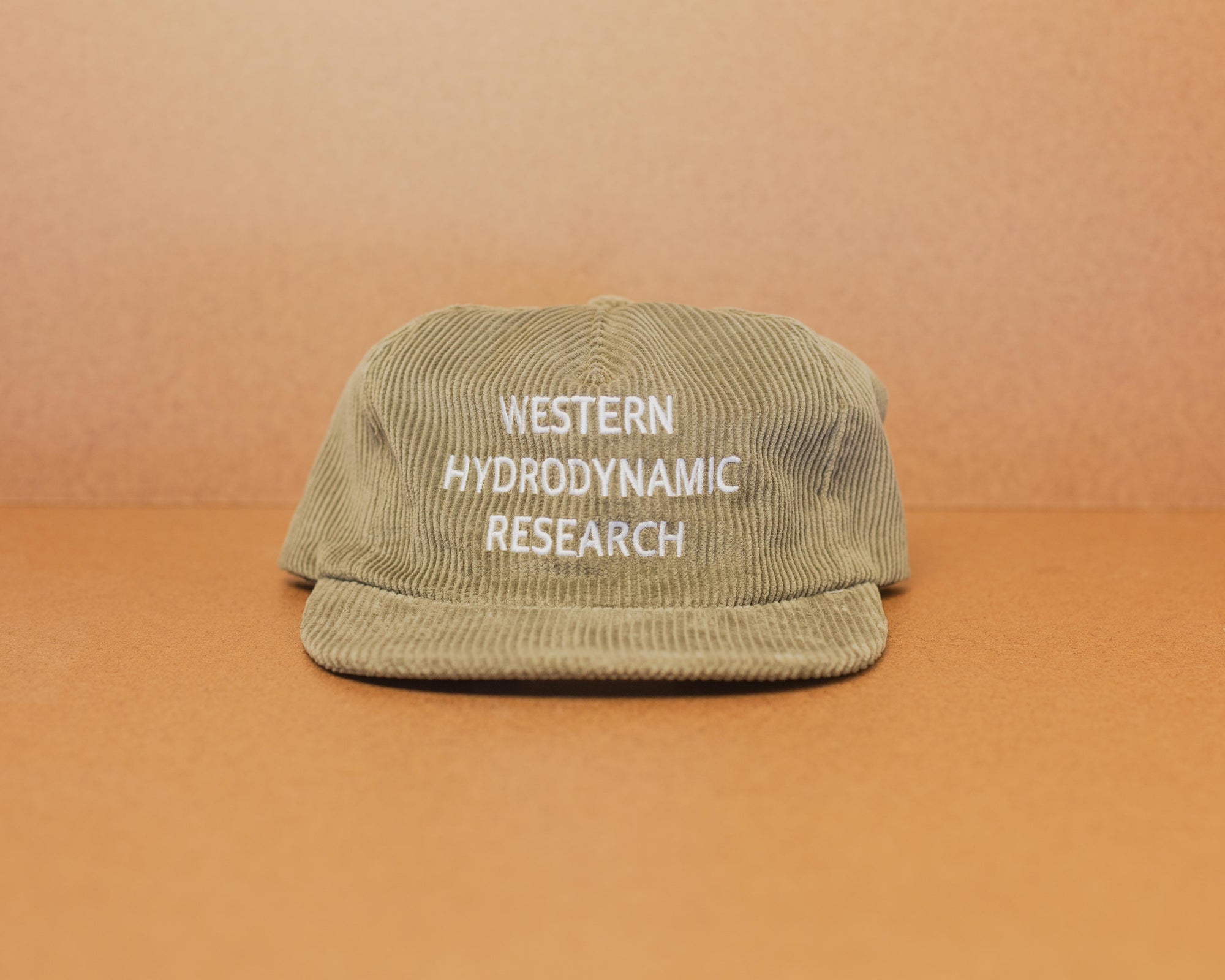 Western Hydrodynamic Research- Whale Cord Hat (Olive) brown background
