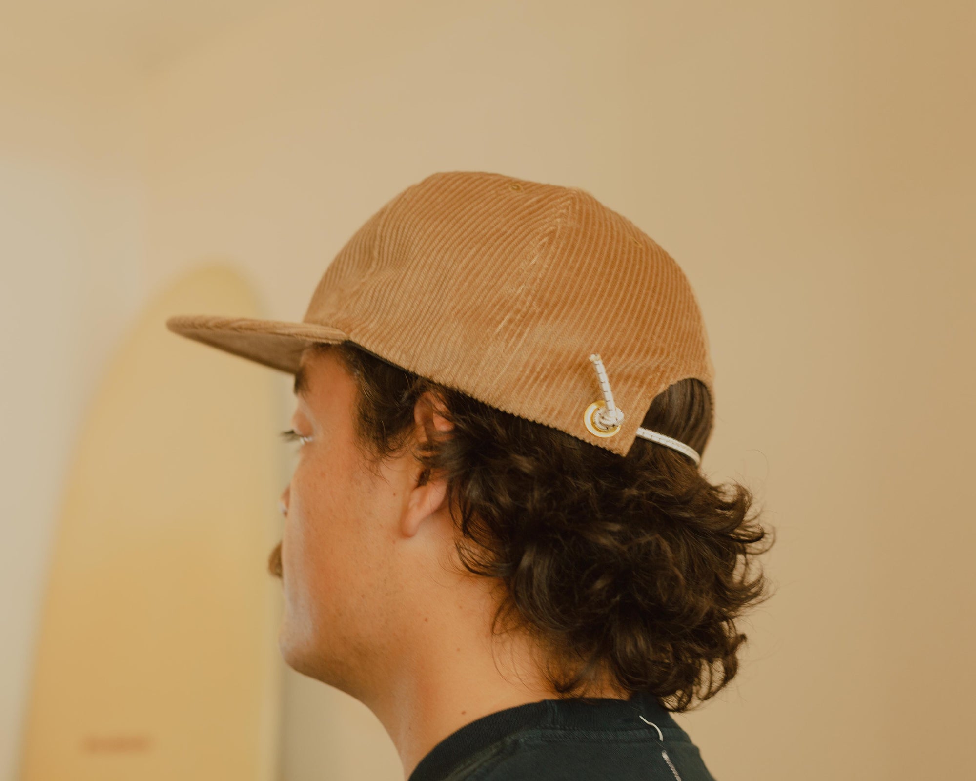 Western Hydrodynamic Research- Whale Cord Hat (Beige) side view on model